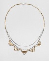From the Black Label Collection. With a look that combines the ancient and the Art Deco, pyramid-shaped pendants with sparkling Swarovski crystal accents hang from a shapely two-tone chain.CrystalBrass and silverplateLength, about 18Width, about ½Lobster claspMade in USA