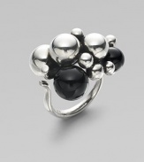 Make a simple statement with this sterling silver piece accented with black agate featuring an organic cluster of spheres. Black agateSterling silverAdjustable fit Width, about 1Imported