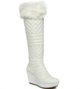 Who says winter boots can't have style? Featuring a quilted shaft and wedge heel, the Pozita boots by GUESS' are positively chic.