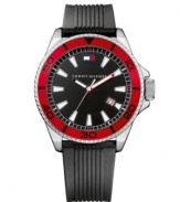 Bold and athletic, this watch by Tommy Hilfiger nails all-American design. Black ribbed silicone strap and round silver tone mixed metal case with red bezel. Black dial features luminous stick indices, date window at four o'clock, red and black luminous hands and logo at twelve o'clock. Quartz movement. Water resistant to 30 meters. Ten-year limited warranty.
