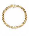 THE LOOKTextured circle links18k goldplated settingLogo charmHammered toggle closureTHE MEASUREMENTWidth, about ½Length, about 17ORIGINMade in Italy