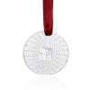 Lalique's iconic Masque de Femme is the centerpiece of this timeless 2011 holiday ornament.