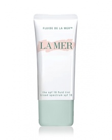 La Mer The SPF 18 Fluid Tint brings a touch of color to the skin for a smooth, even finish. This water-borne formula absorbs instantly into the skin to provide broad-spectrum UVA/UVB protection. A trio of natural and sea-derived ingredients uniquely benefit the skin. Gemstones absorb light energy, transforming it into beneficial green light to enhance antioxidant activity. Photonic spheres within The SPF 18 Fluid Tint redirect and diffuse light. Smart, light-reactive seaweeds impart natural humectant properties to bind moisture and prevent dehydration. Wear over Crème de la Mer to boost its efficacy. Designed for daily use. La Mer The SPF 18 Fluid Tint brings a touch of color to the skin for a smooth, even finish. This water-borne formula absorbs instantly into the skin to provide broad-spectrum UVA/UVB protection. A trio of natural and sea-derived ingredients uniquely benefit the skin. Gemstones absorb light energy, transforming it into beneficial green light to enhance antioxidant activity. Photonic spheres within The SPF 18 Fluid Tint redirect and diffuse light. Smart, light-reactive seaweeds impart natural humectant properties to bind moisture and prevent dehydration. Wear over Crème de la Mer to boost its efficacy. Designed for daily use.