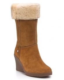 A new look from UGG® Australia! Sleek suede wedges have a genuine shearling cuff for style and comfort.