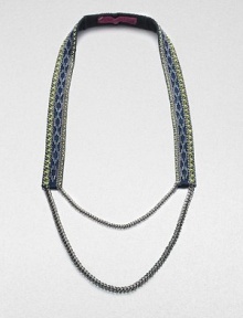 A strap of bright leather, richly adorned with sewn glass beads in a geometric tribal design and edged with golden chains with an oxidized finish.GlassLeatherGoldtoneCotton backingLength, about 19¾Imported A strap of bright leather, richly adorned with sewn glass beads in a geometric tribal design and edged with golden chains with an oxidized finish.GlassLeatherGoldtoneCotton backingLength, about 19¾Imported