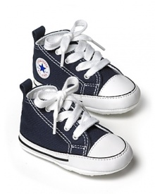 Classic high top Converse sneakers with soft soles for a comfortable fit. Great for gift giving with signature box packaging. Classic high top Converse sneakers with soft soles for a comfortable fit. Great for gift giving with signature box packaging.