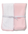 She'll be sound asleep swaddled in heavenly comfort with this sweet cotton blanket set from Carter's.