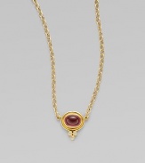 A smooth, pink tourmaline cabochon station with three dazzling diamonds, all set in 18k gold on a chain link necklace. Pink tourmalineDiamonds, .09 tcw18k goldLength, about 18Lobster clasp closure with signature charmMade in Italy