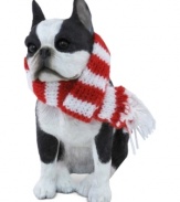 A fetching gift for animal lovers, the Boston terrier Christmas ornament depicts the beloved black and white pup waiting patiently for treats and dressed in a holiday scarf. From Sandicast.