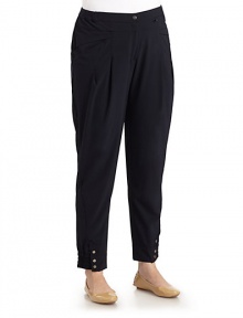 THE LOOKSport pant styling in a draped woven fabricWaistband with elasticized side knit insets and snap closeZip flyFront yokeAngled front pocketsSoft front pleatsBack patch pocketsEasy legWide, smocked snap cuffsTHE FITRise, about 10½Inseam, about 30THE MATERIAL95% polyester/5% elastaneCARE & ORIGINHand washImported