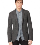 This Calvin Klein Jeans blazer offers a classic look that can be dressed up or down for versatile style.