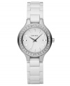 Make every minute brighter with this shining watch by DKNY. White ceramic bracelet and round stainless steel case. Crystal accents at bezel. White dial with logo and silvertone stick indices. Quartz movement. Water resistant to 50 meters. Two-year limited warranty.