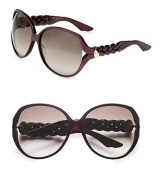 A round-shaped frame with pretty, braided temples. Available in black with grey gradient lens or pearl violet with brown gradient lens. Metal accented, braided temples100% UV protectionMade in Italy