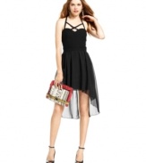 Unleash your inner vixen with this sultry dress from Trixxi! Fierce crisscross straps, a corset-styled bodice and a high-low hem combine to create a look worth all the hype.