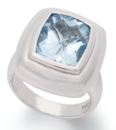 Cushion-cut and totally chic! This glamorous gemstone ring features a cushion-cut blue topaz (4-3/4 ct. t.w.) set in sterling silver. Size 7.