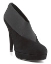 An expanse of stretch elastic wraps these dapper platform booties in modern comfort. By Stuart Weitzman.