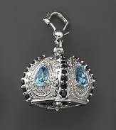 Inspired by Zen philosophy, this polished sterling silver Raja meditation bell from Paul Morelli is set with blue topaz and black spinel.