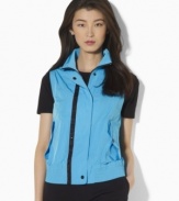 Designed from lightweight microfiber in a bold, bright hue, Lauren by Ralph Lauren's stylish vest features a ventilating mesh interior and sleek hardware for a chic active look.