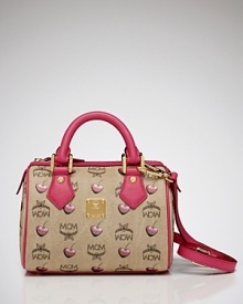 There's no need to shrink from bold style with this logo-splashed satchel from MCM. Boasting a covet-worthy shape, this mini bag makes a major statement with every outfit. There's no need to shrink from bold style with this logo-splashed satchel from MCM. Boasting a covet-worthy shape, this mini bag makes a major statement with every outfit.