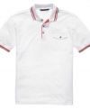 Take your tennis whites up a notch with the crisp all-American tipping of this Sean John polo shirt.