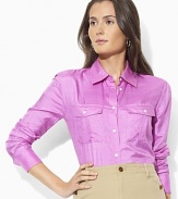 The Ristow cotton shirt updates classic workwear styles with chic rolled sleeves.