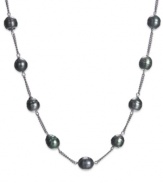 A row of pristine pearls make an elegant mark. This cultured black Tahitian pearl (8-10 mm) tin cup necklace is set in polished sterling silver. Approximate length: 20 inches.