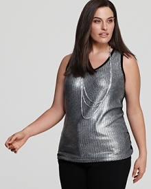 This shimmering Karen Kane tank becomes your glamour go to for a fashion-forward season. This shimmering Karen Kane tank becomes your glamour go to for a fashion-forward season.