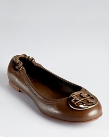 A Tory Burch classic--the must-have Reva flat reappears in buttery soft leather with a gleaming logo.