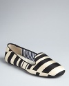 Modern art: these Charles Philip smoking flats add graphic visual interest to a sleek silhouette.