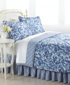 Into the blue. Soothing and serene, the Adeline comforter set from Lauren Ralph Lauren sets a refreshing tone with its garden of coordinating florals and striped bedskirt and reverse. Navy piping finishes the look with tailored distinction. (Clearance)