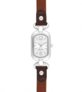 Petite with subtle elegance, by Nine West. Watch crafted of brown leather strap and oval silver tone mixed metal case. Silver tone dial features tonal applied stick indices, numerals at twelve and six o'clock, silver tone hour and minute hands, sweeping second hand and logo at six o'clock. Quartz movement. Limited lifetime warranty.