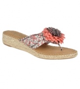 Flirty and feminine. Highlight a fresh pedicure with the floral-accented Rio thong sandals by Life Stride.