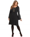 Look chic in cooler temps with Style&co.'s long sleeve plus size sweater dress, crafted from a striped knit.