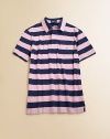 A classic polo rendered in striped knit cotton for a preppy look.Point collarShort sleevesFront button placketPatch pocketUneven vented hemCottonMachine washImported Please note: Number of buttons may vary depending on size ordered. 