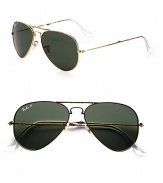 Classic metal aviator sunglasses fold to fit into your pocket. Available in gold with green crystal lens.Metal temples100% UV protectionMade in Italy 