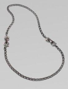 From the Jewels Verne Collection. A bold woven chain of sterling silver with a black rhodium finish has pretty filigree links with red garnet and goldplated accents.Red garnetBlack rhodium-plated sterling silver and rose goldplated sterling silverLength, about 26Imported