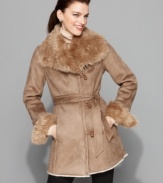 Look fashionable and stay warm from morning to night in this faux shearling coat from Jones New York. (Clearance)