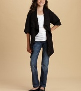 Cozy cascade cardigan in an extra-warming, extra-fuzzy bouclé knit.Deeply-ribbed border and cuffsCascading open frontShort sleevesLong, hip length85% acrylic/15% nylonHand washImportedAdditional InformationKid's Apparel Size Guide 