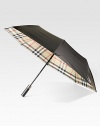 This walking umbrella offers a shiny-sleek look and ample coverage from the elements.Automatic openOpen diameter, about 47Folded length, about 37PolyesterImported