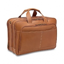 Heritage. Handmade. Original. Hartmann's signature line, the J. Hartmann Collection is handcrafted of the finest Aged Belting Leather. With it's natural top-grain luster finish, top-stitched detail and antique brass hardware, each piece is like a fine wine that only gets better as it ages. Interior finishing with a natural suede lining and compartments designed for all of today's needs, it represents the best of Hartmann's design heritage and classic styling. Indestructible lightweight framing allows ease of handling through the most difficult travel. Lost bags can be located with the Global Recovery System (GRS), providing travelers with peace of mind. Heritage. Handmade. Original. Hartmann's signature line, the J. Hartmann Collection is handcrafted of the finest Aged Belting Leather. With it's natural top-grain luster finish, top-stitched detail and antique brass hardware, each piece is like a fine wine that only gets better as it ages. Interior finishing with a natural suede lining and compartments designed for all of today's needs, it represents the best of Hartmann's design heritage and classic styling. Indestructible lightweight framing allows ease of handling through the most difficult travel. Lost bags can be located with the Global Recovery System (GRS), providing travelers with peace of mind.