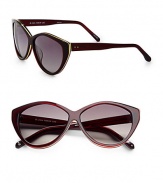 These retro-inspired resin frames are embellished in contrasting metal. Available in translucent burgundy with smoke gradient lens. 100% UV protectionImported