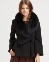 Lush fox fur adds a touch of vintage charm to this shapely topper, cinched in the middle by a waist-defining belt.Genuine Fox fur collarBell sleevesPrincess seamsSelf beltSlash pockets65% polyester/35% viscoseDry clean by a fur specialistImportedFur origin: ChinaModel shown is 5'8½ (174cm) wearing US size Small.