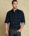 Tartan adds a classic patterned look to this slim-fit shirt from Tommy Hilfiger.