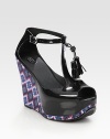 Chunky printed wedge with an adjustable t-strap, tassel laces and a slight peep toe. Self-covered wedge, 5 (125mm)Self-covered platform, 1½ (40mm)Compares to a 3½ heel (90mm)Rubber upperRubber lining and solePadded insoleImportedOUR FIT MODEL RECOMMENDS ordering one half size down as this style runs large. 