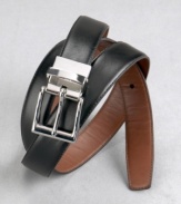 Have it both ways. This handsome black leather belt reverses with a simple twist of the buckle to a an equally fetching brown belt. Silver hardware, embossed logo on each side.
