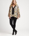 Beyond glamorous, an airy top featuring an embroidered neckline, kimono sleeves and a lively print. Pair this relaxed-fit design with slim pants or skinny jeans.Embellished necklineDolman sleevesAllover printPull-on styleAbout 29 from shoulder to hemViscoseDry cleanMade in USA