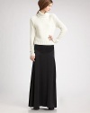 Long flared style with contrast insets below the hips.Elasticized grosgrain waist Back zipper with hook-and-eye Silk lining About 45 long Silk Dry clean Imported
