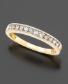 Round-cut channel-set diamonds (1/5 ct. t.w.) and 14k yellow gold are a posh pairing in this elegant diamond ring.