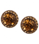 Smoky sophistication stands out on Givenchy's stud earrings. A light Colorado topaz glass stone is surrounded by pave accents. Crafted in brown gold tone mixed metal. Approximate diameter: 1-1/2 inches.