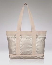 Carry your weekend essentials in style with this durable nylon travel tote from LeSportsac. Carry your weekend essentials in style with this durable nylon travel tote from LeSportsac.